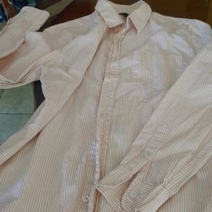 Men Casual button down shirt. Size Medium. Color stripped pink